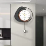 Modern decorative wall clock with geometric design in a luxury home setting.