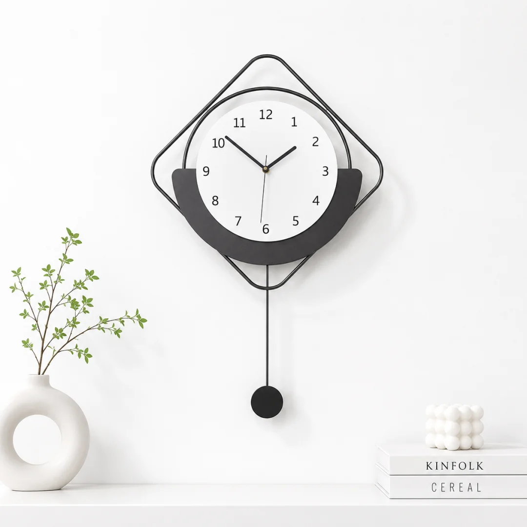 Modern Minimalist Wall Clock Modern black and white wall clock with minimalist design and decorative accents.