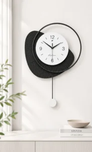Modern black and white wall clock with abstract design, perfect for luxury home decor.