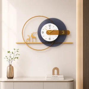 Modern luxury wall clock with gold accents and decorative deer figurines on a shelf.