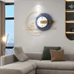 Modern luxury wall clock with gold accents in a stylish living room.
