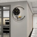 Modern decorative wall clock with bird design in a luxury home interior.