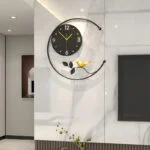 Modern decorative wall clock with bird design in a luxury home setting.