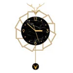 Luxury black and gold wall clock with deer design, modern home decor accessory.