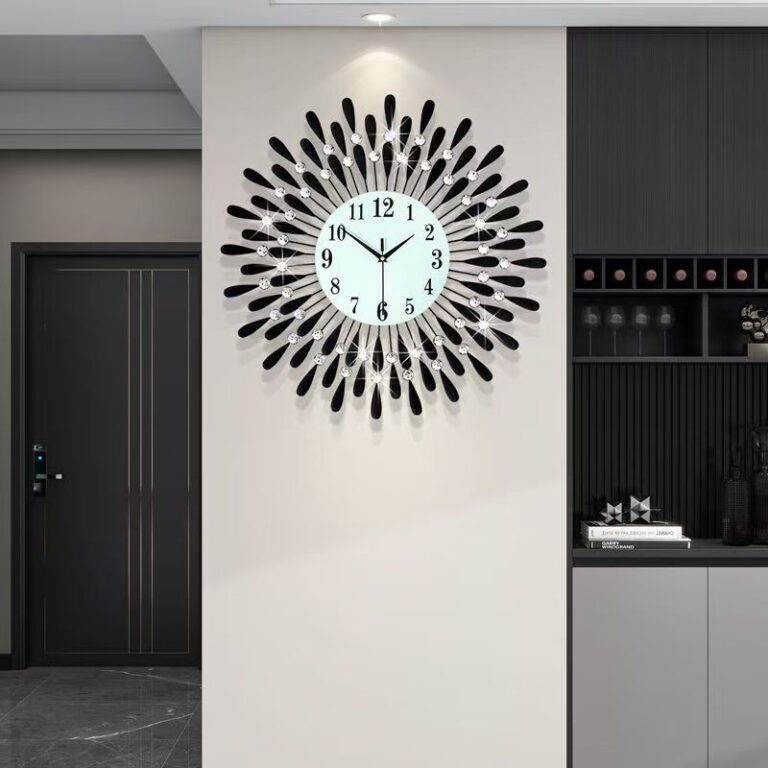 Modern decorative wall clock with black and silver accents in a luxury home setting.