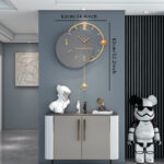 Modern luxury wall clock with gold accents in a stylish home interior.