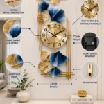 Modern luxury wall clock with gold and blue leaf design, featuring bold numerals and durable metal construction.