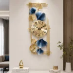 Luxury gold and blue decorative wall clock in modern living room.