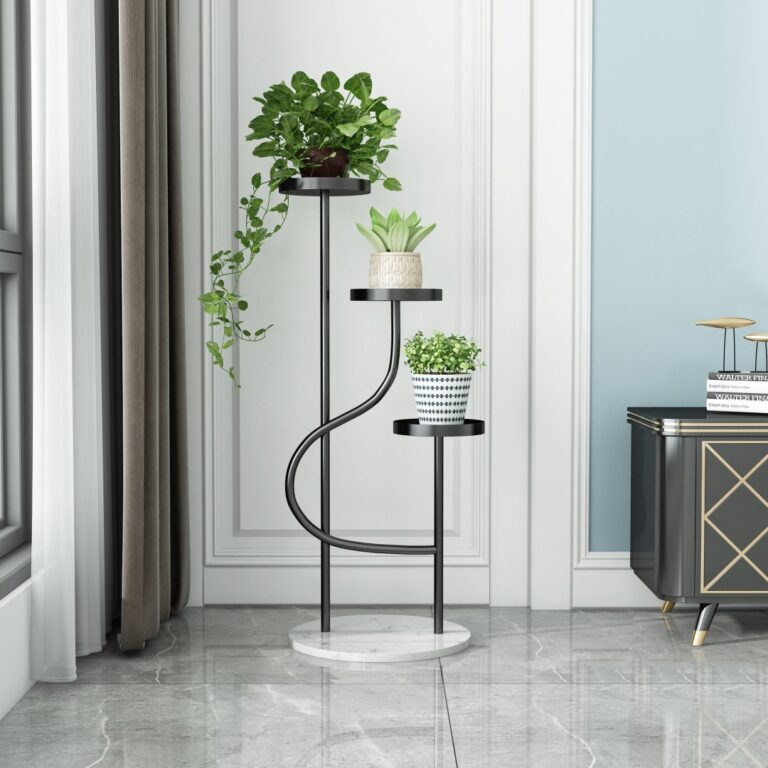 Modern indoor planter stand with three levels and decorative plants in a luxury home setting.