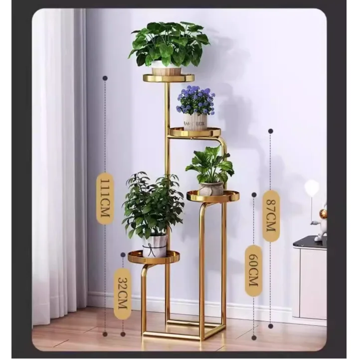 Gold metal indoor planter stand with multiple levels and potted plants, modern home decor.