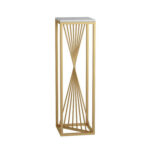 Modern gold decorative pedestal with geometric design for luxury home decor.