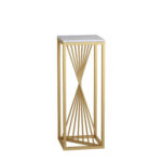 Modern gold and white decorative pedestal for luxury home decor.