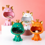 Colorful cat-shaped decorative ornaments with crowns, ideal for modern home decor and accessories.