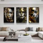 Modern luxury wall art with abstract female portraits in gold and black, enhancing home decor.
