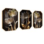 Modern luxury wall art with floral design, featuring gold and black tones.