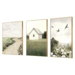 Modern wall art set with nature scenes, including a path, house, and birds, in gold frames.