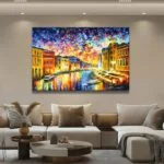 Modern living room with colorful framed wall art and luxury decor.