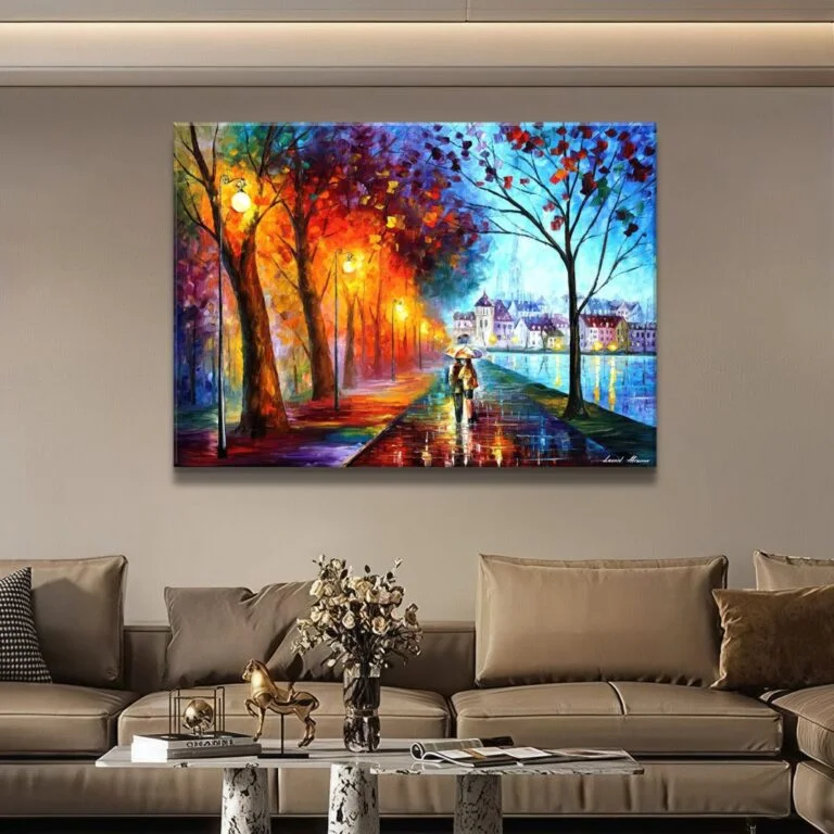 Modern wall art with vibrant colors in a living room setting, featuring a framed painting of a colorful street scene.