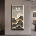 Illuminated wall art with mountains and digital clock, modern home decor.