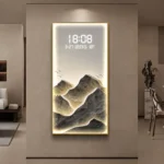 Modern illuminated wall art with mountain design and LED clock display.