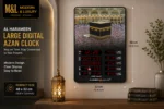 Large digital Azan clock with Kaaba image, modern Islamic wall decor.