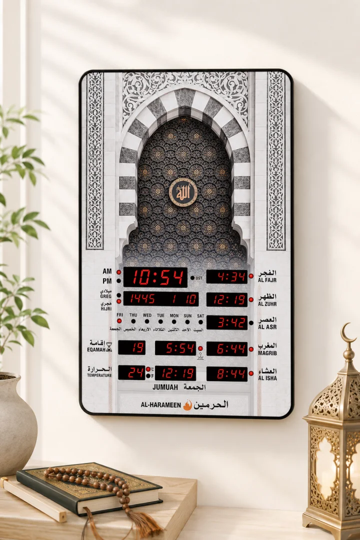 Islamic wall clock with digital prayer times, Arabic calligraphy, and mosque design.