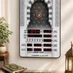Islamic wall art with Azan prayer clock and Arabic calligraphy, modern home decor.