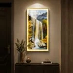 Modern illuminated wall art with waterfall scene, luxury home decor.