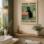 Modern bathroom with cat-themed wall art and decorative plants.