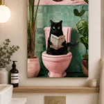 Modern wall art of a black cat on a pink toilet, surrounded by plants, in a stylish bathroom.