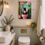 Modern bathroom with framed wall art, decorative accessories, and luxury home decor.