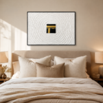 Modern luxury bedroom with framed Kaaba wall art and neutral decor.