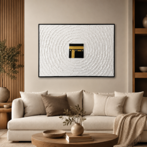 Modern luxury living room with framed Kaaba wall art and neutral decor.