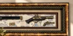 Antique firearms in a shadowbox with a map background, framed in ornate wood.