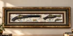 Antique pistols in a shadowbox with vintage map background, framed wall art for home decor.