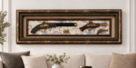 Antique pistol shadowbox wall art with ornate frame, displayed above a sofa.
