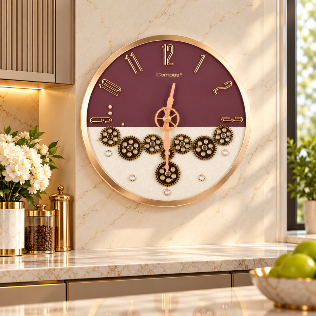 Elegant plum and gold wall clock with gear design in a modern kitchen setting.