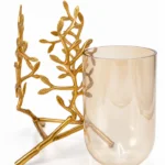 Gold branch glass holder, modern decorative accessory for luxury home decor.