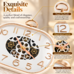 Luxury oval clock with elegant top handle and intricate gear centerpiece, featuring premium metallic finish and raised numerals.