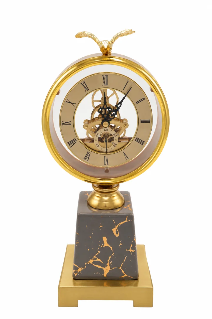 Ornate gold skeleton clock with marble base, luxury home decor