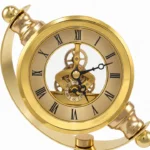 Polished gold skeleton clock with Roman numerals and visible gears, luxury home decor accessory.